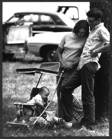 Couple with stroller and baby